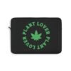 This plant lover weed leaf laptop sleeve features a bold weed leaf design with 'Plant Lover' written around it, all in a green color same as the weed leaf itself. Weed Leaf Tote Bag is black
