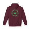 This plant lover weed leaf hoodie features a bold weed leaf design with 'Plant Lover' written around it, all in a green color same as the weed leaf itself.