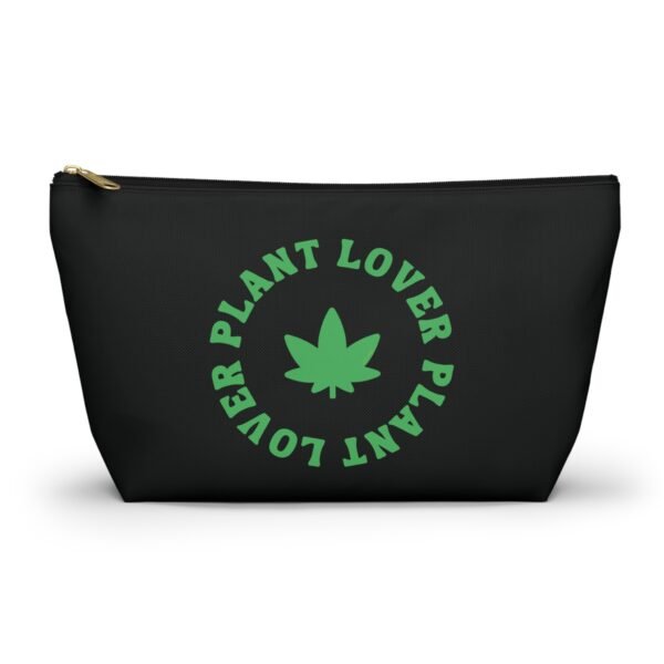 Front - 2025-11-25T220739.736 This plant lover weed leaf pouch t-bottom features a bold weed leaf design with 'Plant Lover' written around it, all in a green color same as the weed leaf itself. Weed Leaf pouch t-bottom is black