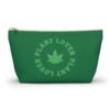 Front - 2025-11-25T220831.583 This plant lover weed leaf pouch t-bottom features a bold weed leaf design with 'Plant Lover' written around it, all in a green color same as the weed leaf itself. Weed Leaf pouch t-bottom is black