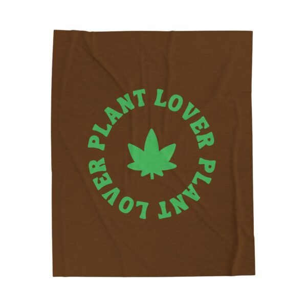 This plant lover weed leaf blanket features a bold weed leaf design with 'Plant Lover' written around it, all in a green color same as the weed leaf itself. Weed Leaf blanket is brown