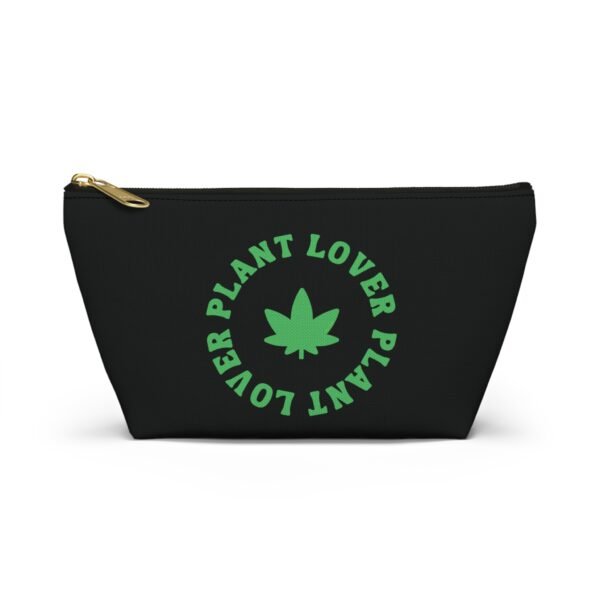 Front (53) This plant lover weed leaf pouch t-bottom features a bold weed leaf design with 'Plant Lover' written around it, all in a green color same as the weed leaf itself. Weed Leaf pouch t-bottom is black