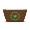 Front (56) This plant lover weed leaf pouch t-bottom features a bold weed leaf design with 'Plant Lover' written around it, all in a green color same as the weed leaf itself. Weed Leaf pouch t-bottom is brown
