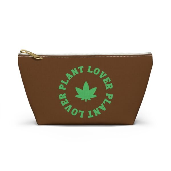 Front (56) This plant lover weed leaf pouch t-bottom features a bold weed leaf design with 'Plant Lover' written around it, all in a green color same as the weed leaf itself. Weed Leaf pouch t-bottom is brown