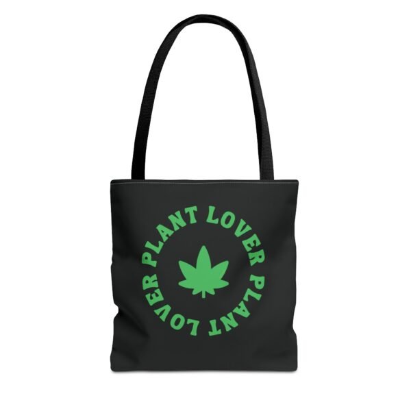 This plant lover weed leaf tote bag features a bold weed leaf design with 'Plant Lover' written around it, all in a green color same as the weed leaf itself. Weed Leaf Tote Bag is black.