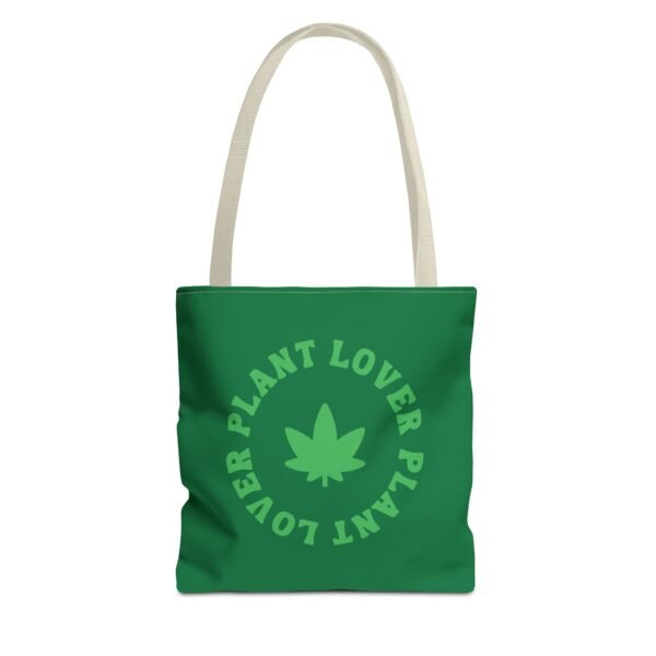 This plant lover weed leaf tote bag features a bold weed leaf design with 'Plant Lover' written around it, all in a green color same as the weed leaf itself. Weed Leaf Tote Bag is green