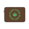 This plant lover weed leaf laptop sleeve features a bold weed leaf design with 'Plant Lover' written around it, all in a green color same as the weed leaf itself. Weed Leaf Laptop Sleeve is Brown
