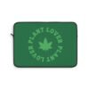 This plant lover weed leaf laptop sleeve features a bold weed leaf design with 'Plant Lover' written around it, all in a green color same as the weed leaf itself. Weed Leaf Laptop Sleeve is Green