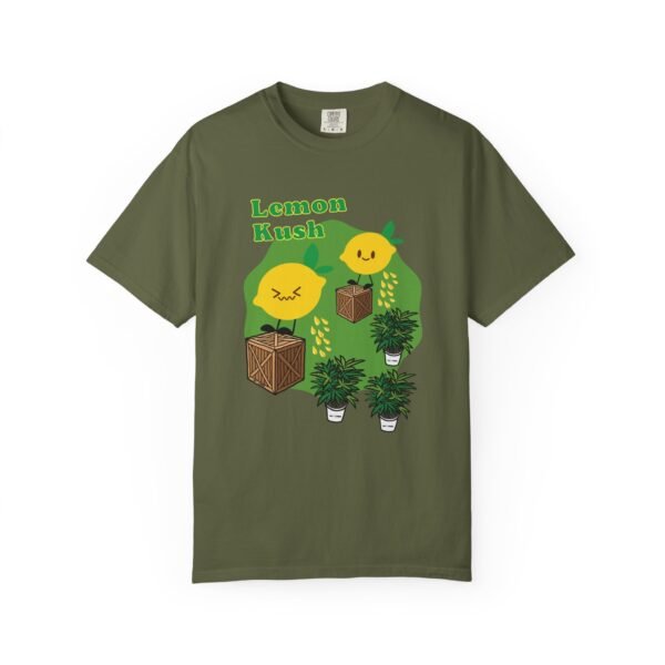 This Lemon Kush T-shirt features two weed leaves two lemons standing on boxes squirting lemon juice on weed plants like they are peeing on them. "Lemon Kush is written above the lemons with a green background.
