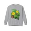 This Lemon Kush Sweatshirt features two weed leaves two lemons standing on boxes squirting lemon juice on weed plants like they are peeing on them. "Lemon Kush is written above the lemons with a green background.