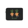 This high thymes laptop sleeve features two thyme plants smoking joints with 'High Thymes' written below in green
