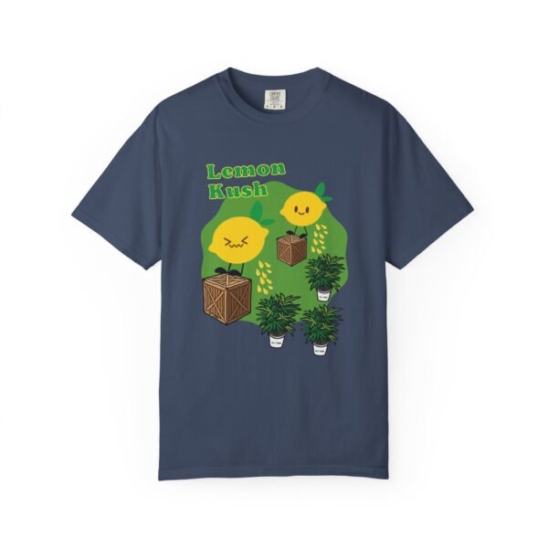 This Lemon Kush T-shirt features two weed leaves two lemons standing on boxes squirting lemon juice on weed plants like they are peeing on them. "Lemon Kush is written above the lemons with a green background.
