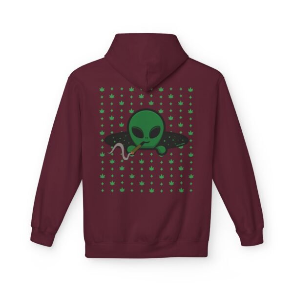 Green Alien Portal Hoodie features a green alien popping out of a black hole smoking a blunt. weed pattern behind alien
