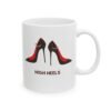 This high heels mug features two grey high heels smoking joints with 'High Heels' written below in red.