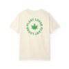 This plant lover weed leaf t-shirt features a bold weed leaf design with 'Plant Lover' written around it, all in a green color same as the weed leaf itself.