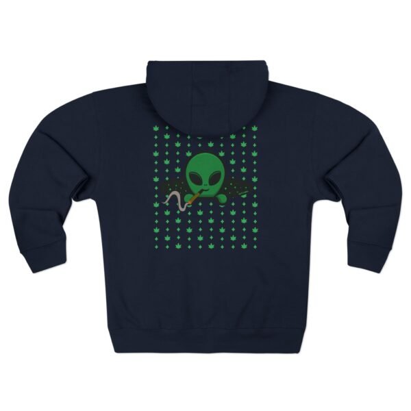 Green Alien Portal Zip up features a green alien popping out of a black hole smoking a blunt. weed pattern behind alien