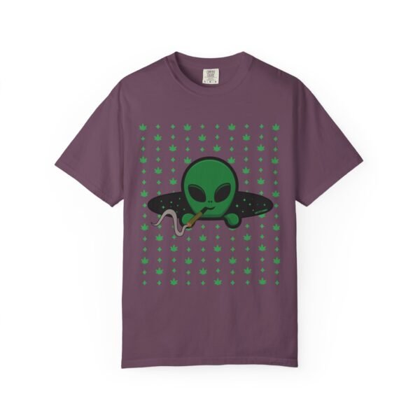 5689767186192771148_2048.jpeg Green Alien Portal T-Shirt features a green alien popping out of a black hole smoking a blunt. weed pattern behind alien