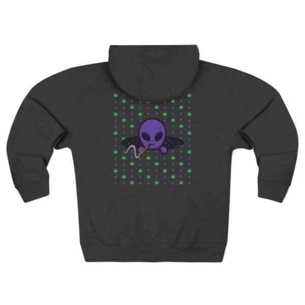 Purple Alien Portal zip up features a purple alien popping out of a black hole smoking a blunt. weed pattern behind alien