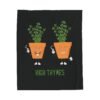 This high thymes blanket features two thyme plants smoking joints with 'High Thymes' written below in green