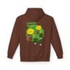 This Lemon Kush hoodie features two weed leaves two lemons standing on boxes squirting lemon juice on weed plants like they are peeing on them. "Lemon Kush is written above the lemons with a green background.