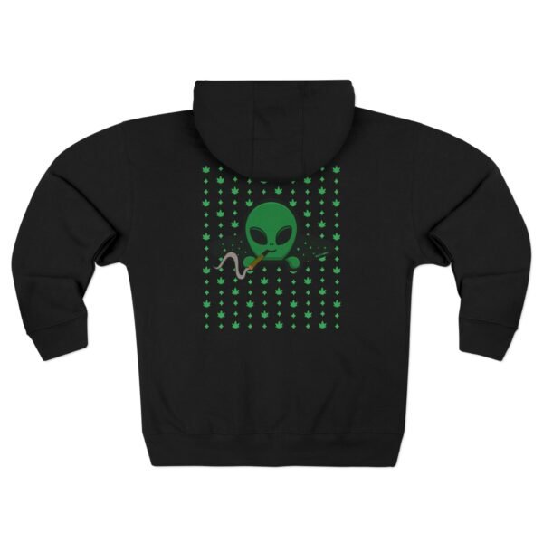 Green Alien Portal Zip up features a green alien popping out of a black hole smoking a blunt. weed pattern behind alien