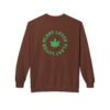 This plant lover weed leaf sweatshirt features a bold weed leaf design with 'Plant Lover' written around it, all in a green color same as the weed leaf itself.