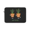 This high thymes laptop sleeve features two thyme plants smoking joints with 'High Thymes' written below in green