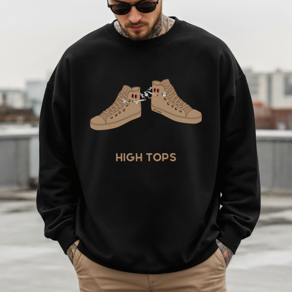guy on top of a parking structure wearing a black high tops sweatshirt crewneck